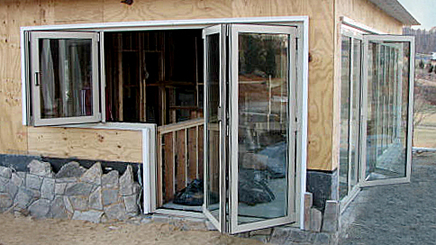 one eight-panel bifold door unit and one four-panel dual bifold door and bifold window unit, split evenly, with a floating jamb