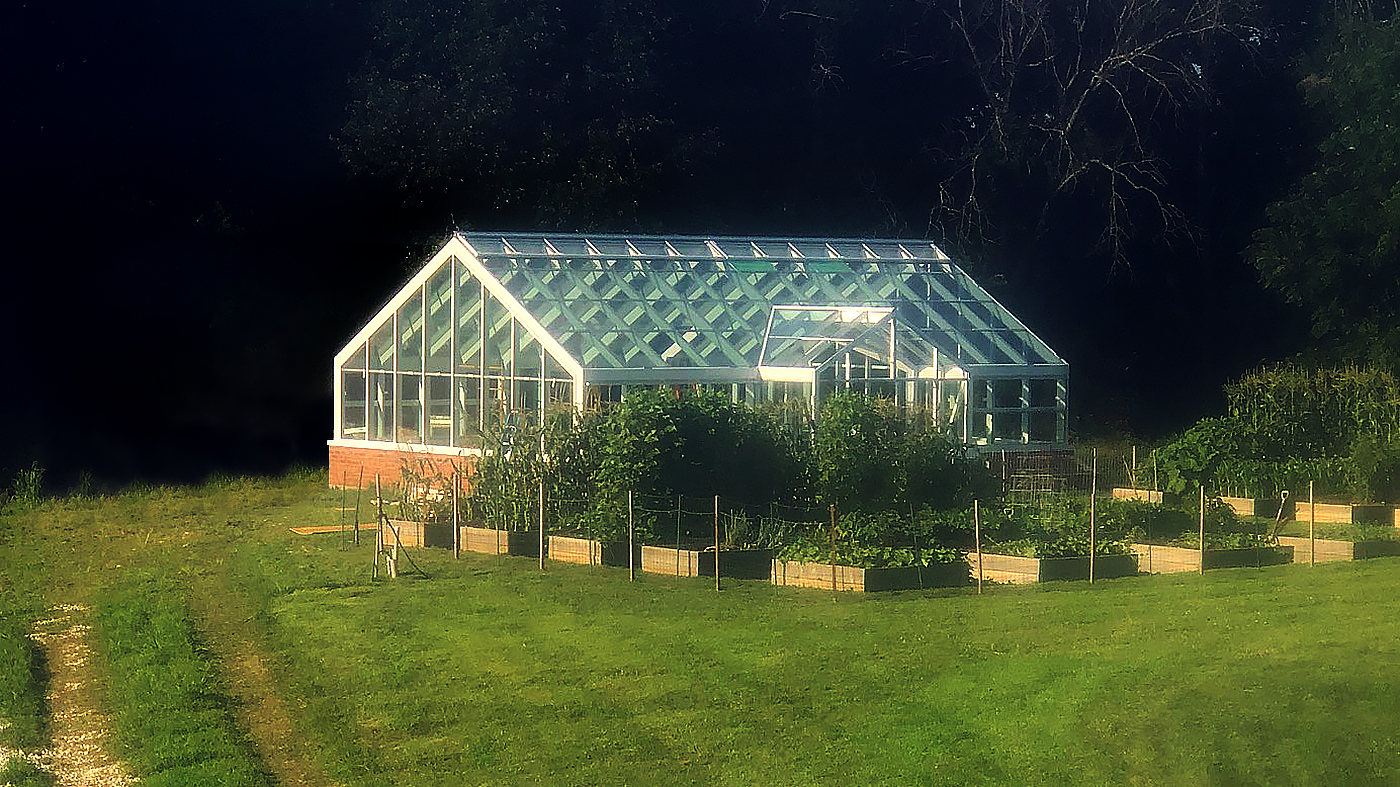 Straight eave double pitch greenhouse with a dormer and two gable ends