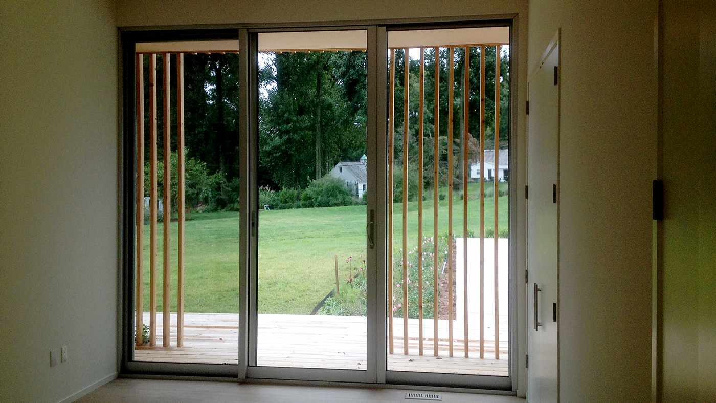 Two six-panel bifold door units, one three-panel (OXO configuration) multi-track sliding glass door unit. fixed windows
