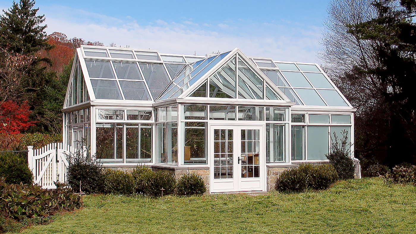 Straight eave double pitch greenhouse with a dormer