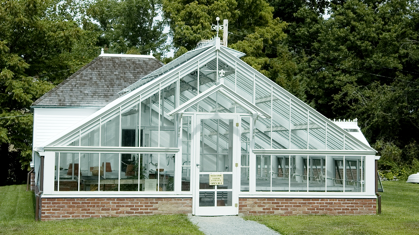 Straight eave, double pitch greenhouse with one glass partition. Attached double pitch greenhouse. Restoration System.