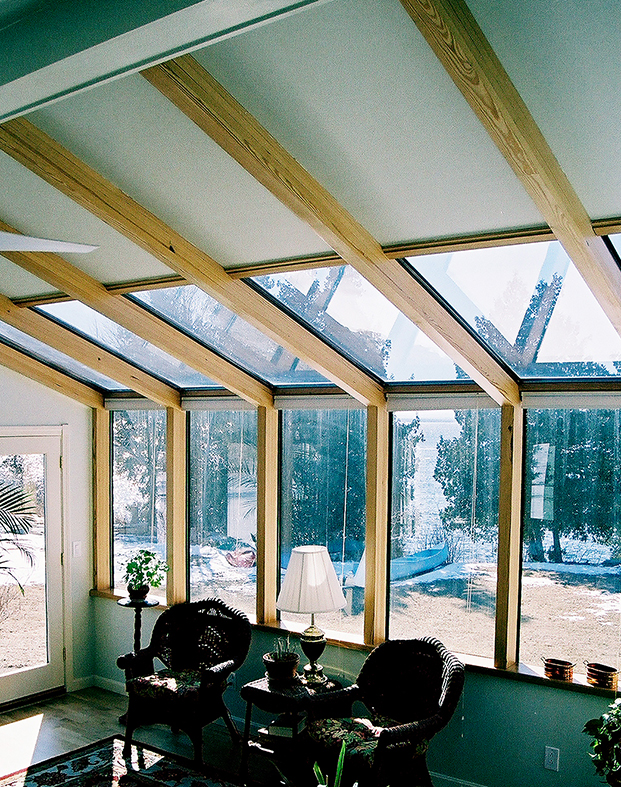 Straight eave lean-to skylight with Yellow Pine glulam interior and solid panel infills