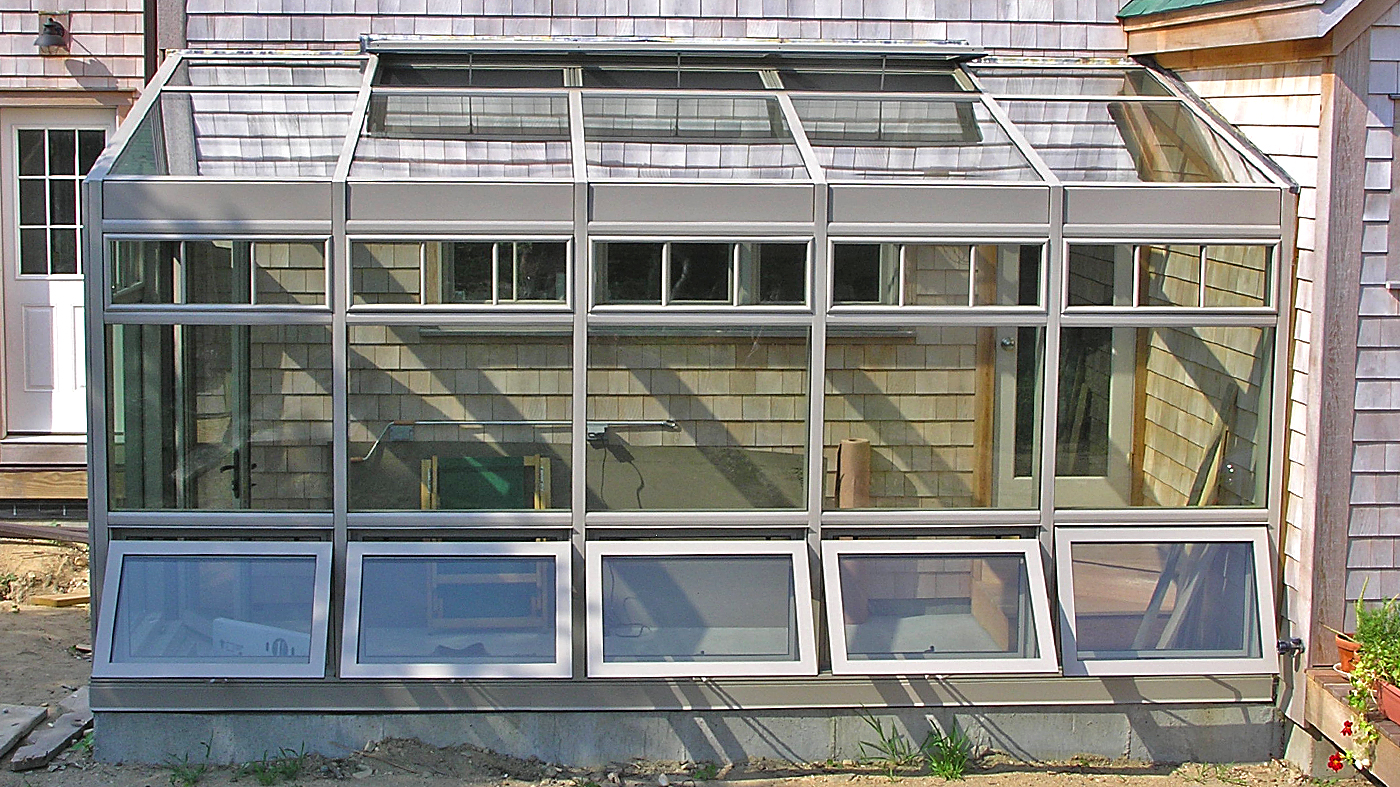 Straight eave lean-to greenhouse.