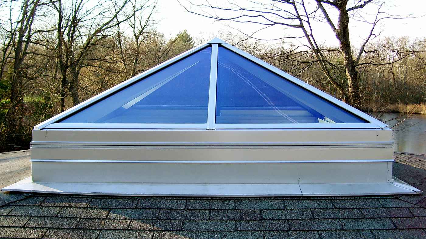 Pyramid skylight and straight eave double pitch skylights.