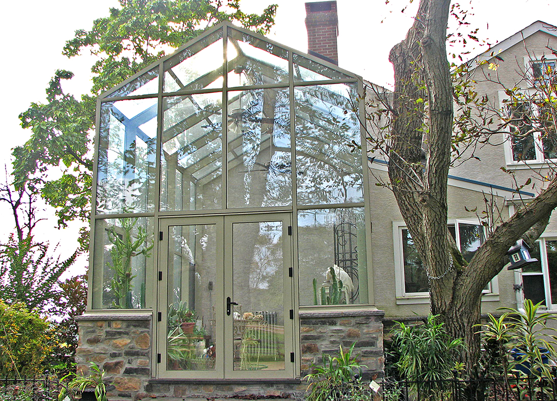 Straight eave double pitch greenhouse.