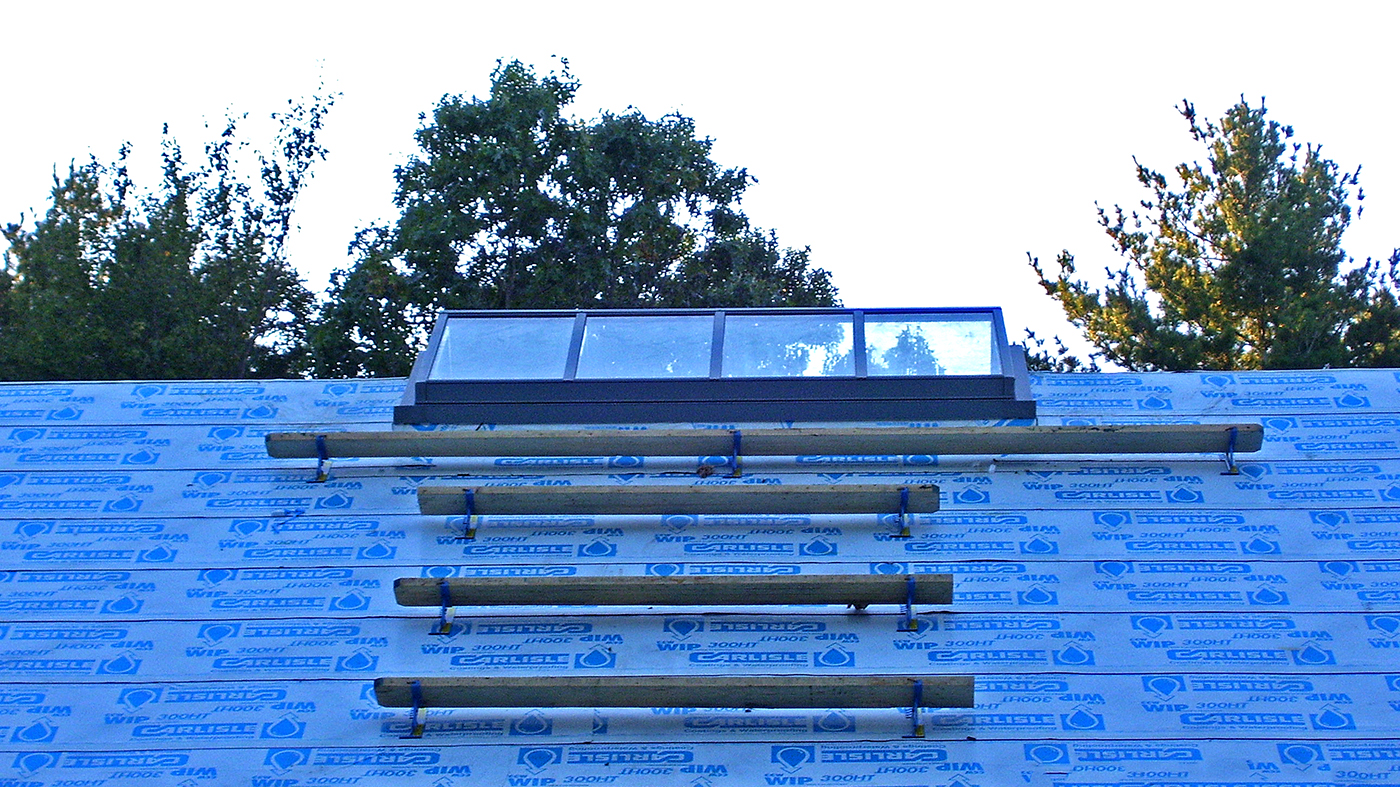 Straight eave double pitch skylight.