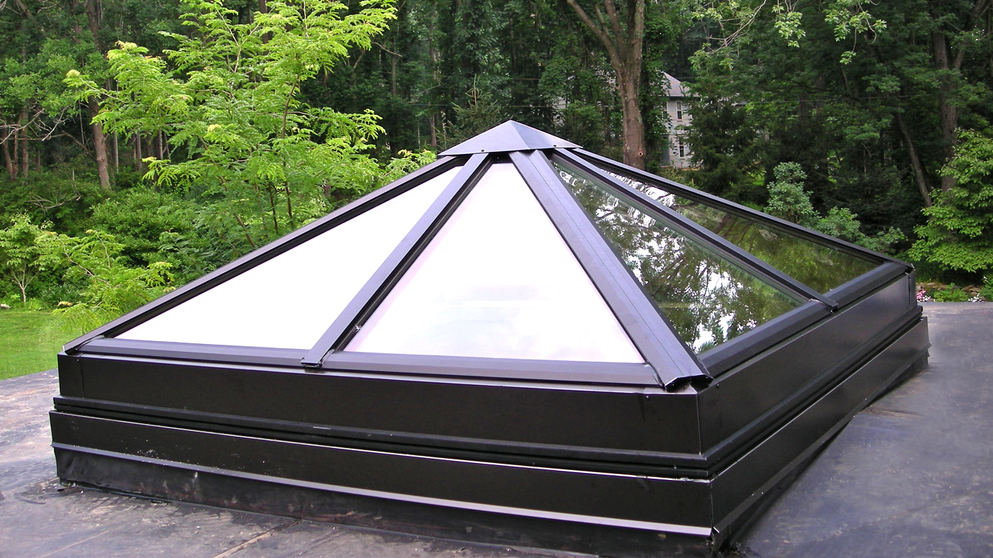 Curb-mounted pyramid skylight.