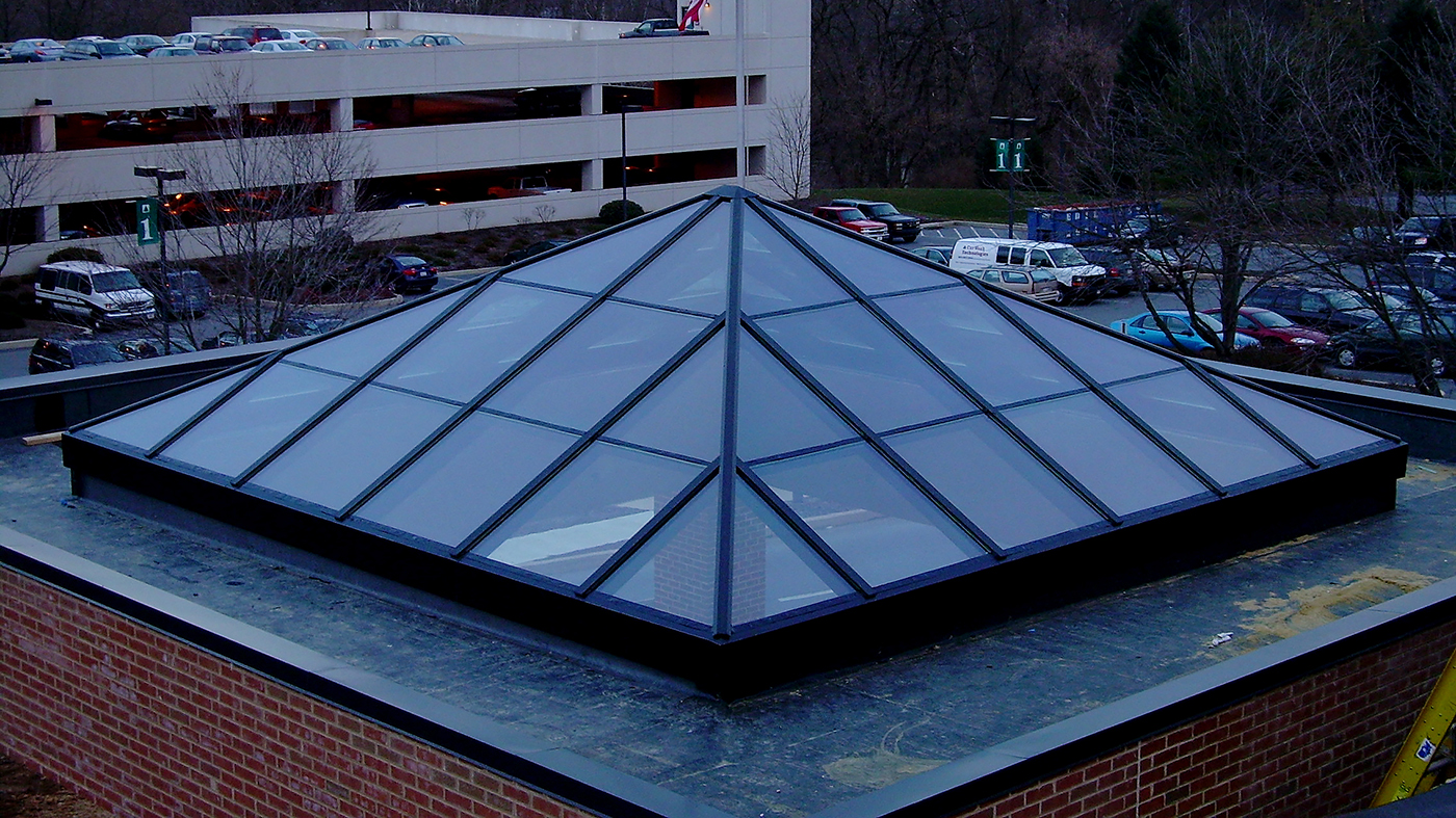 Pyramid skylight acting as canopy. Framing system is 3x6 aluminum system in Dark Bronze Anodized frame finish. Glazing is Sol-I-Guard 272.