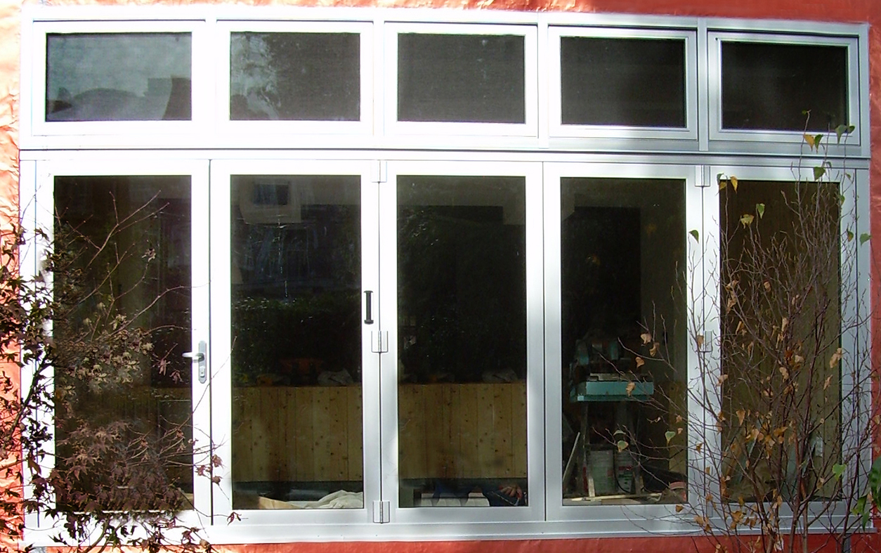 Bifold and sliding glass doors with hopper windows