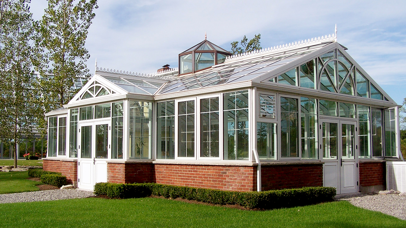 Straight Eave Double Pitch greenhouse with two gable ends, dormer and cupola.