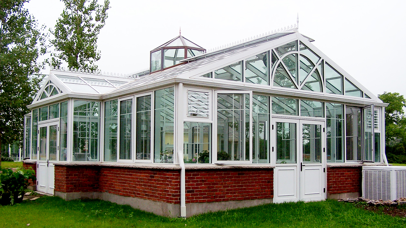 Straight Eave Double Pitch greenhouse with two gable ends, dormer and cupola.