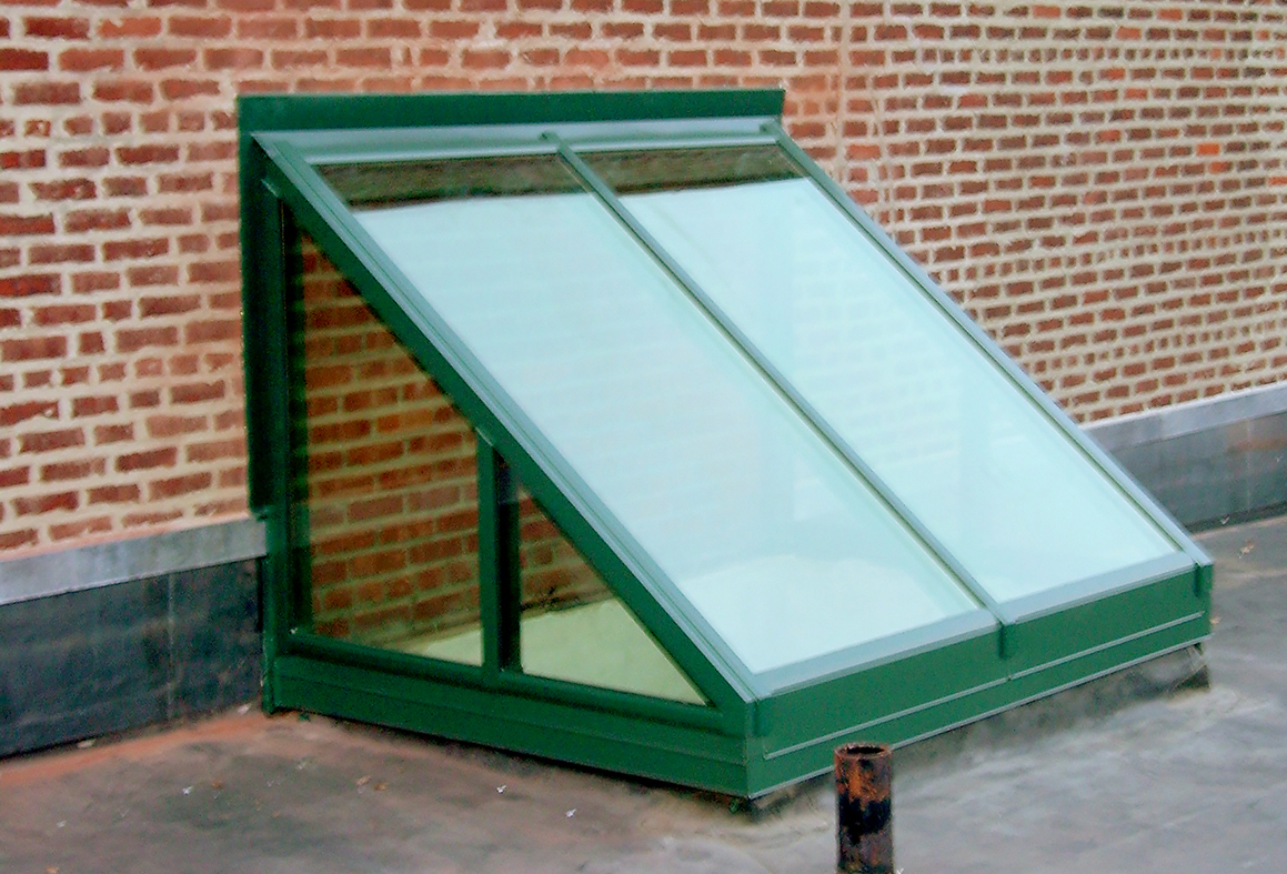 Three skylights including two straight eave lean-to configurations and one straight eave double pitch transom with eave vents.