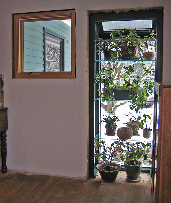 Straight eave lean-to garden window.