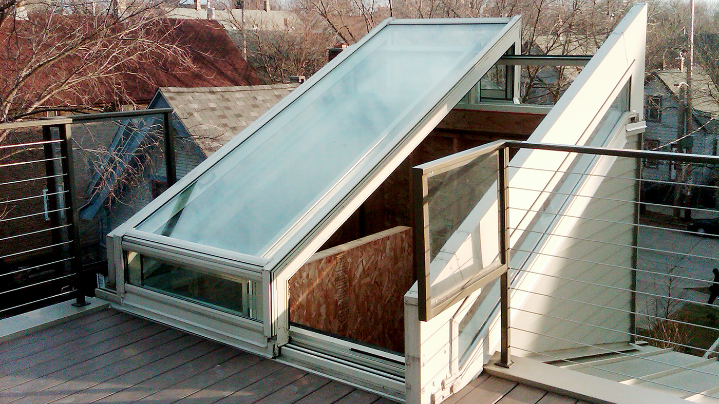 Manually operable straight eave lean-to skylight