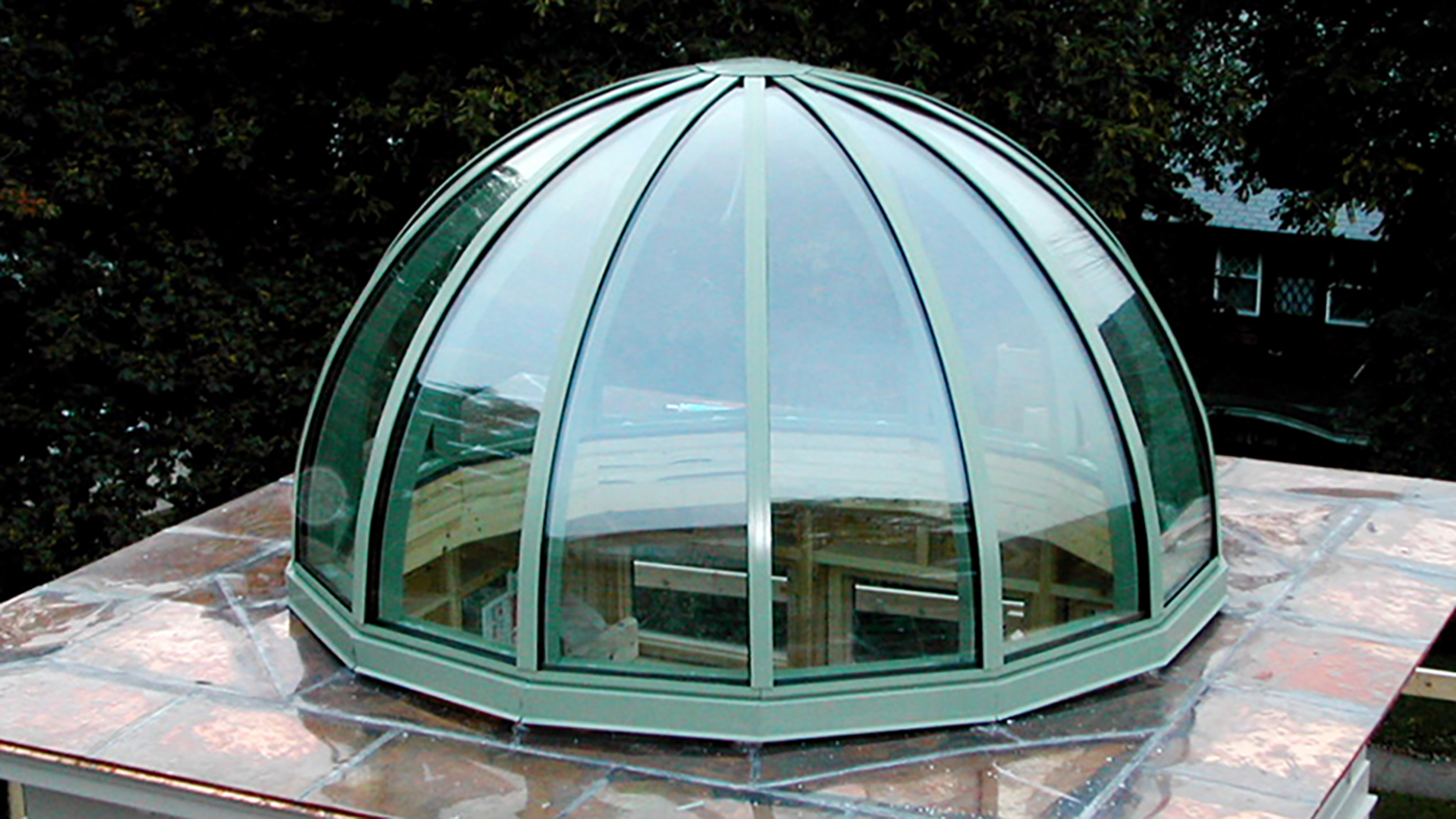 Fourteen sided dome skylight with copper clad exterior.