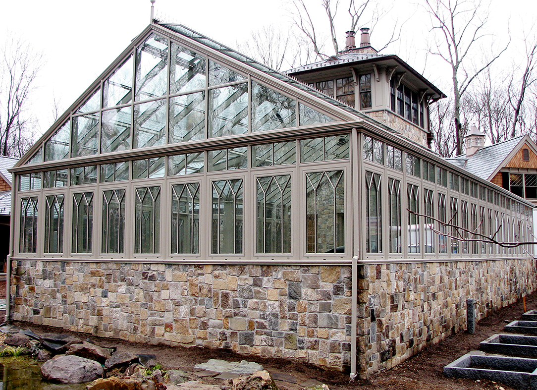 Straight eave double pitch greenhouse with partial lean to extension