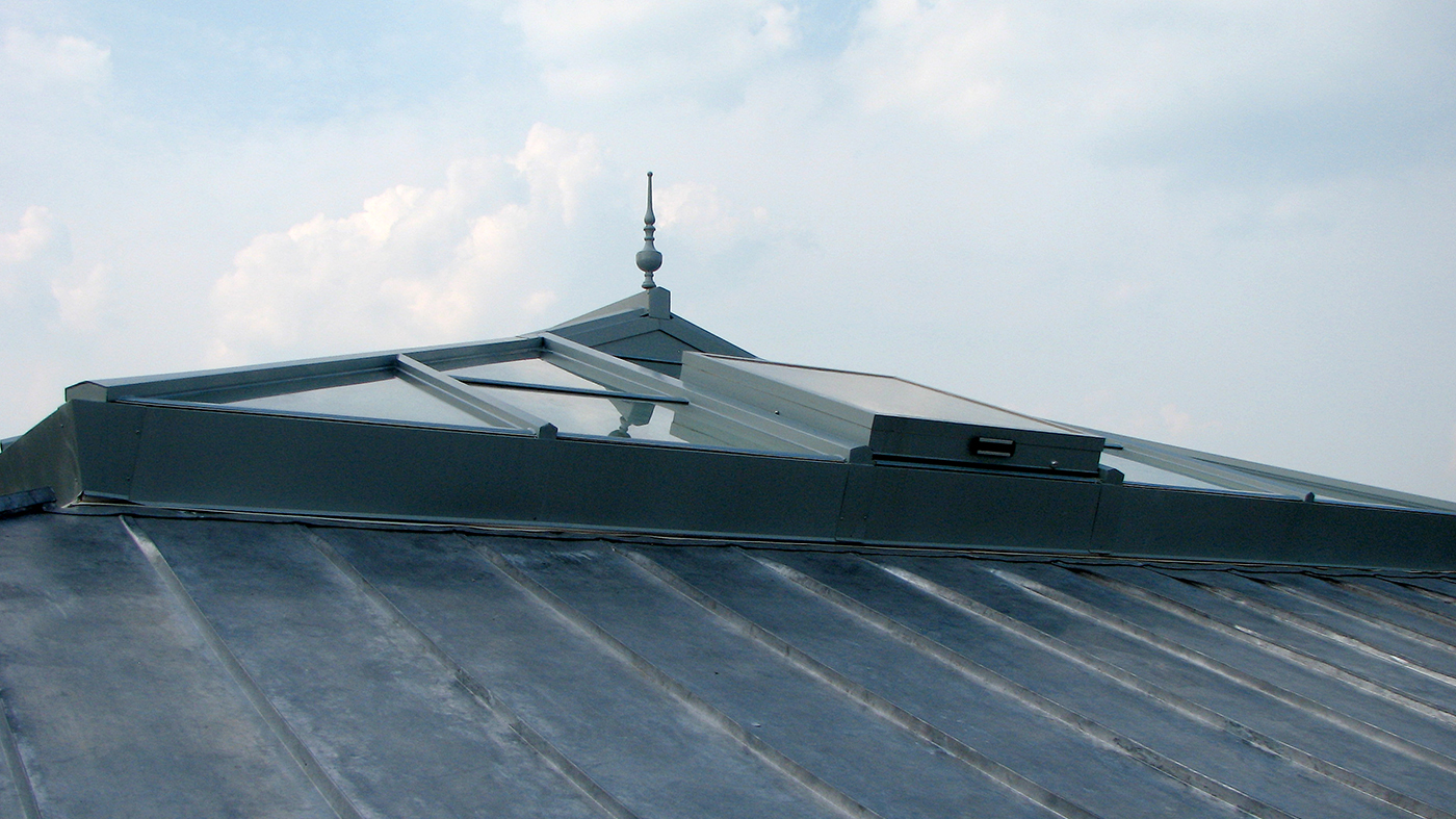 Straight eave double pitch venting skylight