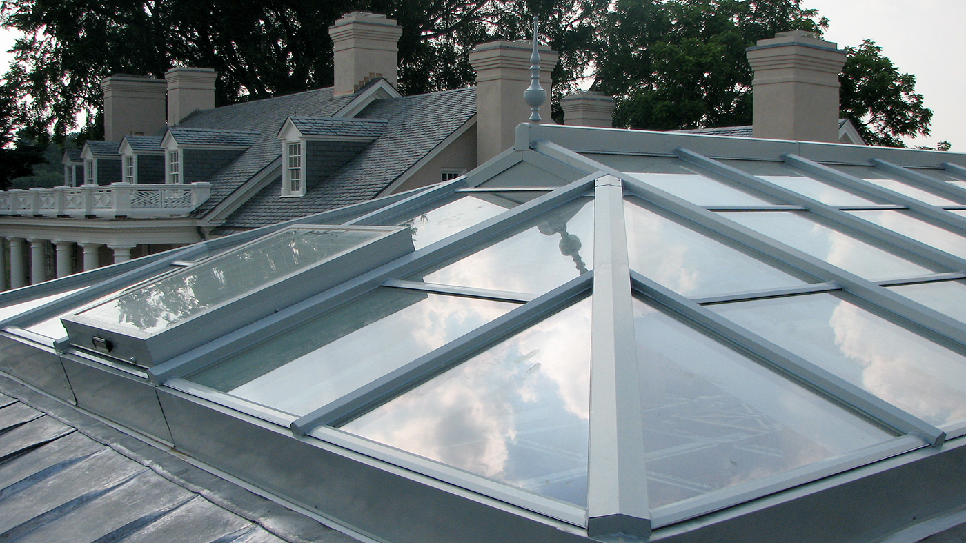 Straight eave double pitch venting skylight