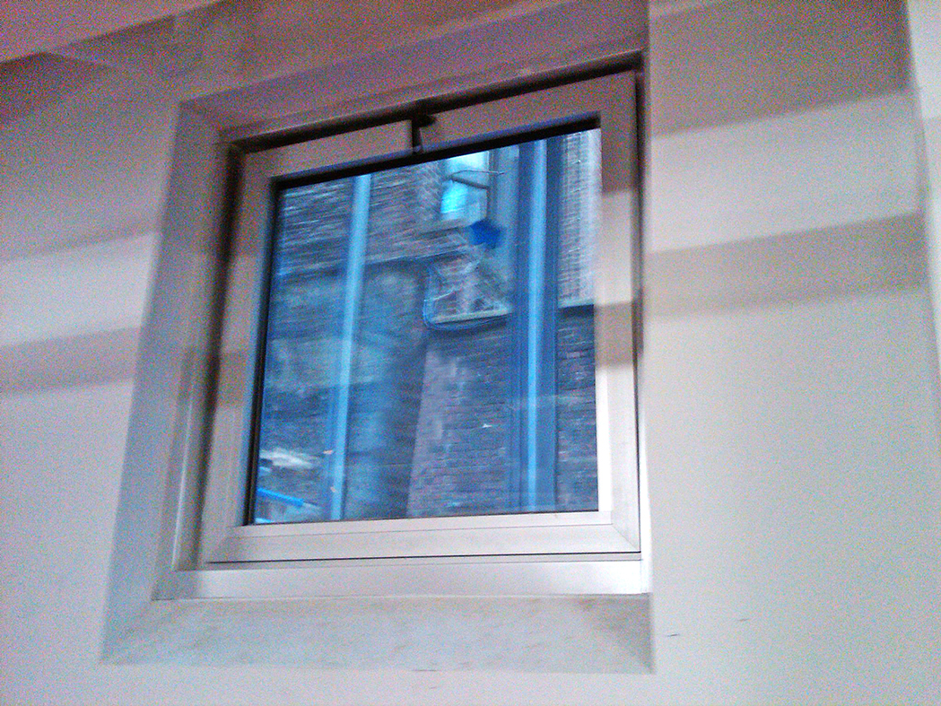Hopper windows and in-swing casement window.