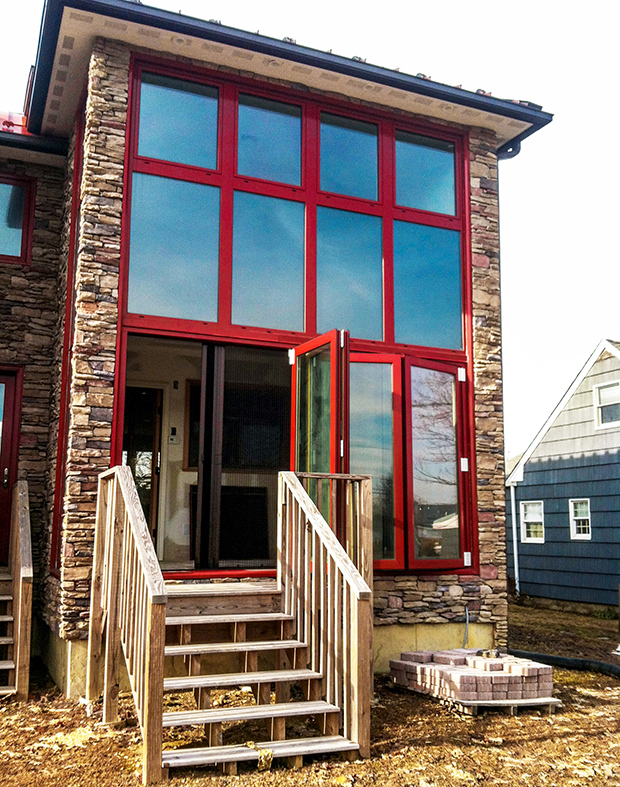 European window all system with integrated bifold doors and inswing casement windows.