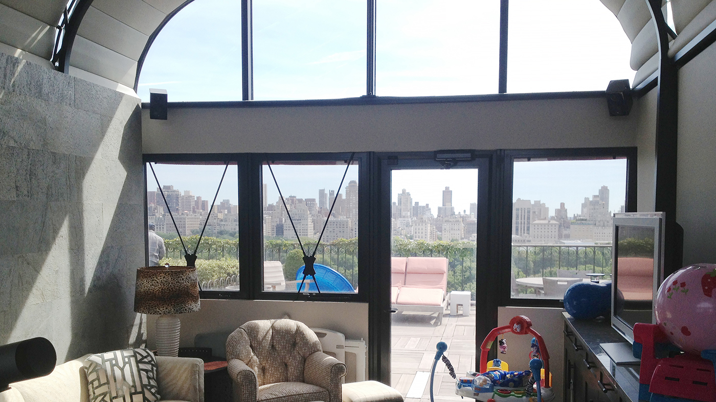 Curved Eave Double Pitch Sunroom(Ogee style) located in New York City's Central Park West District. NYC traffic was re-routed for install and the project was featured on DIY Network's 