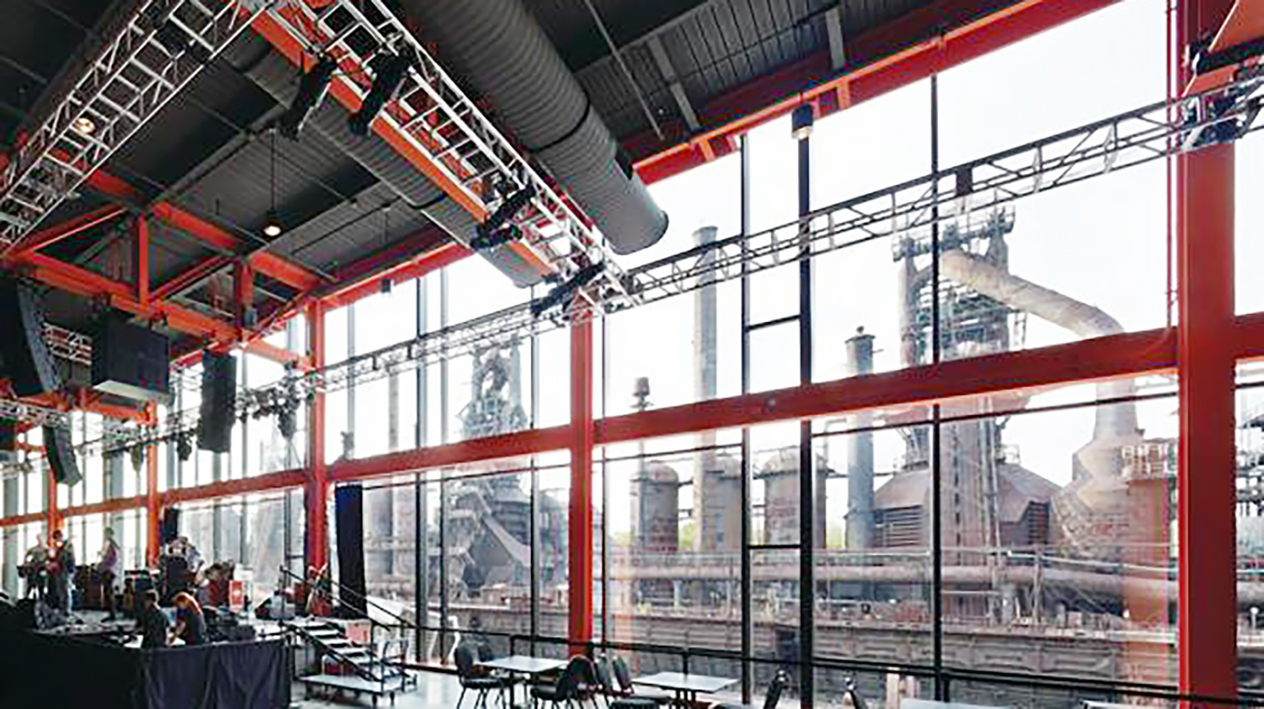 Folding Glass Wall (Mid Wall Split) in use at the Bethlehem Steel Stacks for dining and retail sales purposes.