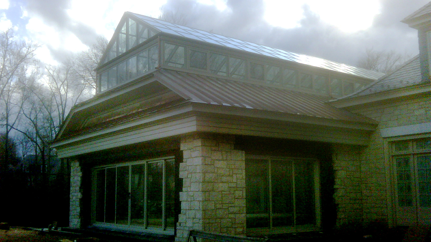 Straight eave double pitch skylight with gridded transom windows