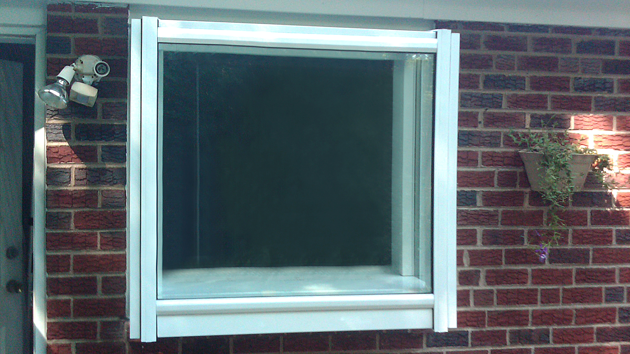 Straight eave lean-to garden window, hopper windows, and tilt/turn windows.
