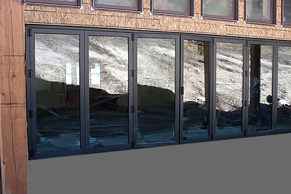 Bifold door/folding glass wall.