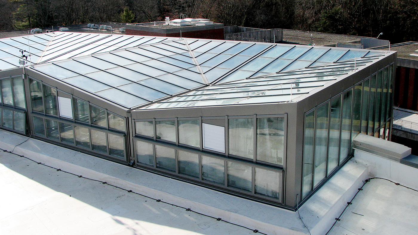 Inverted straight eave double pitch greenhouse