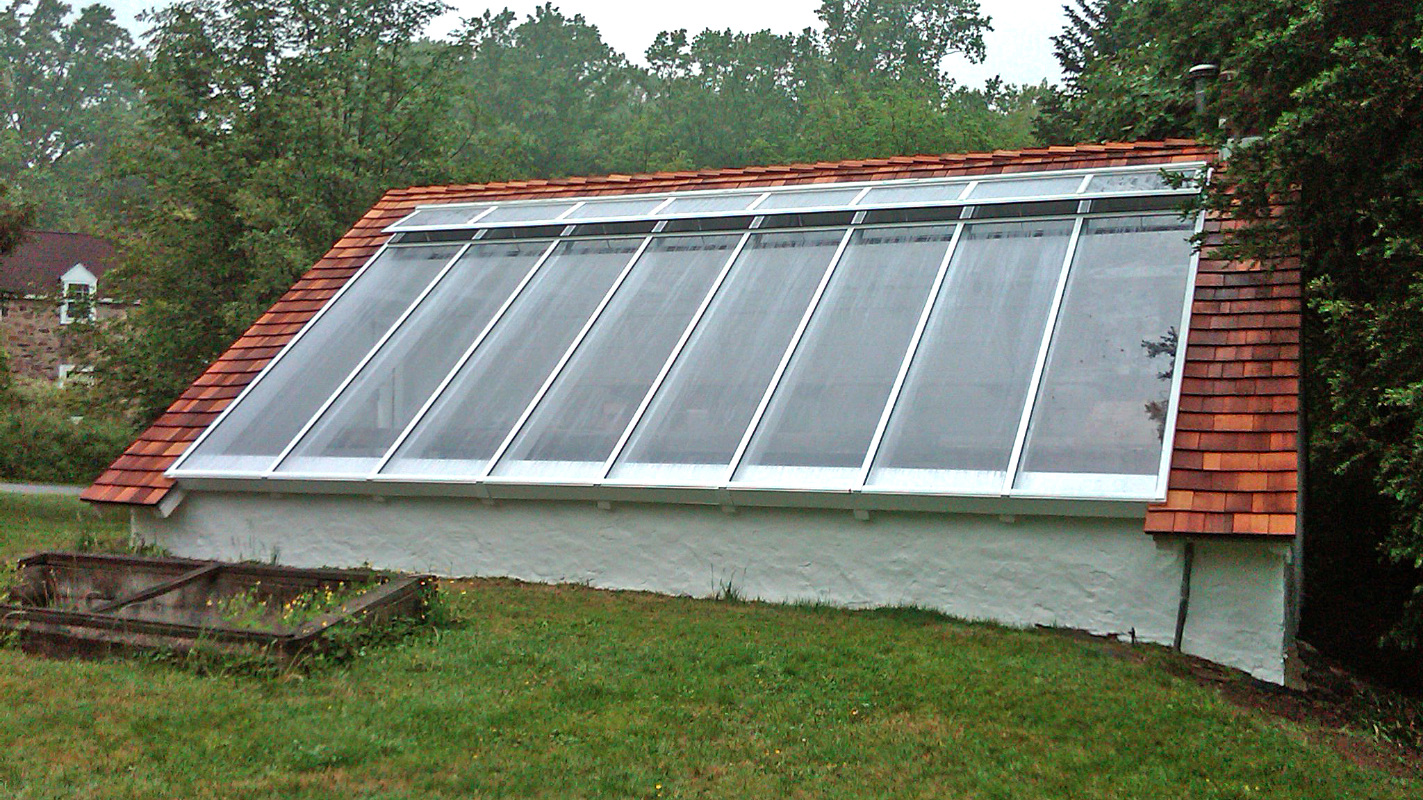 Straight eave lean-to skylight with polycarbonate.