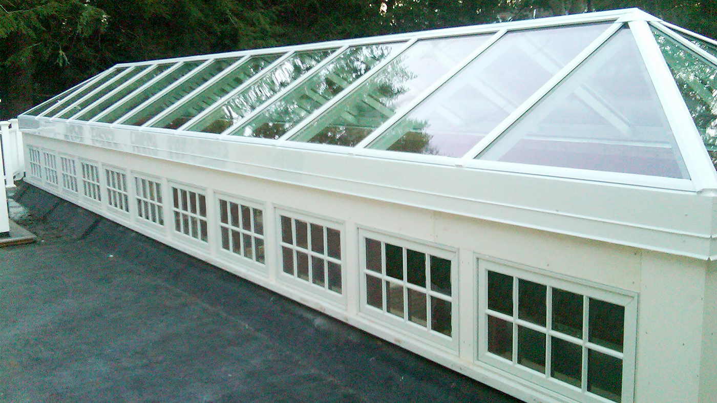 Straight eave double pitch skylight with two hip ends, and a pyramid skylight.