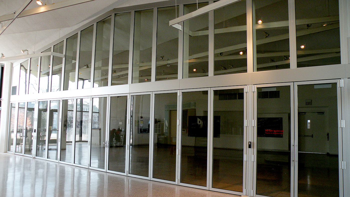 One bifold door system and two sets of French doors incorporated into an aluminum curtain wall