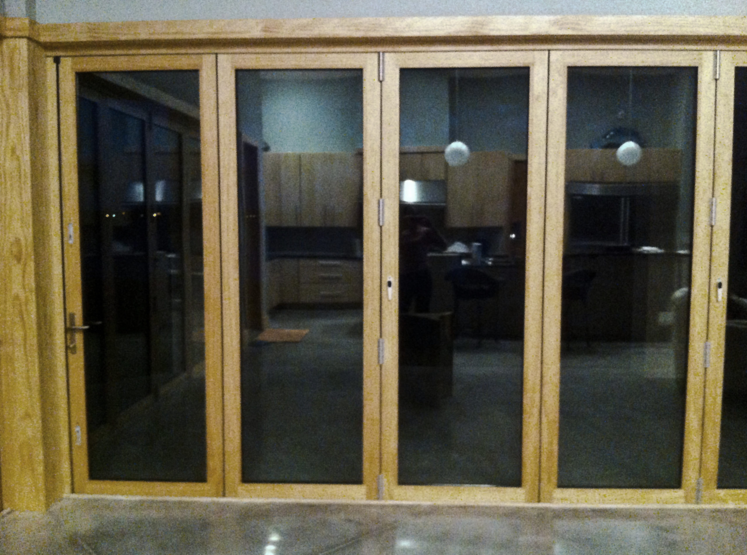 Bifold doors with wood veneer interior
