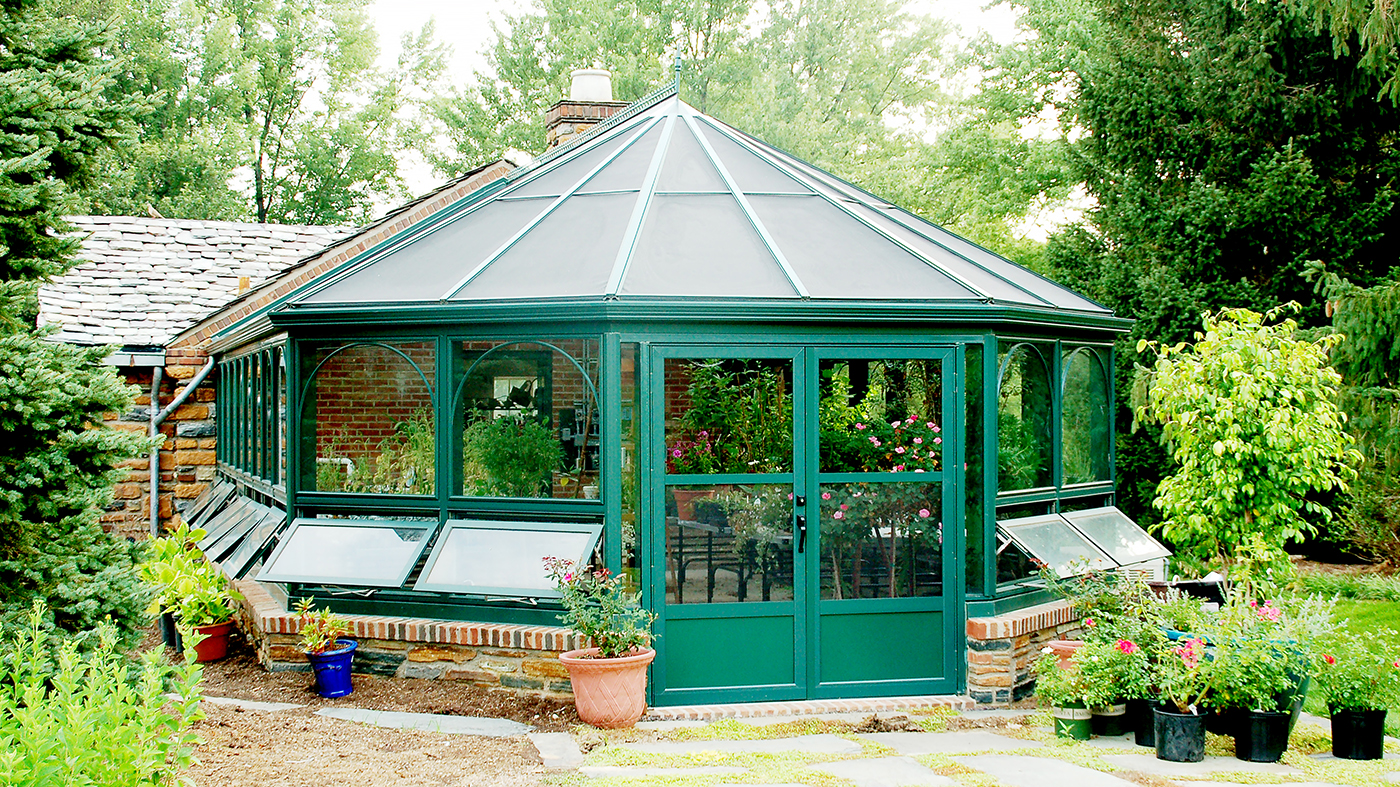 Straight eave, double pitch with conservatory nose, decorative appliques, arched grids and ring and collar ties.
