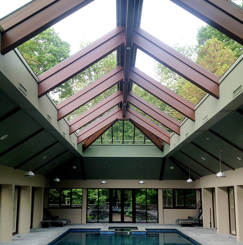 Operable/Retractable double pitch skylight with 2 hip ends. This skylight is perfect to bring the outdoor weather and sunlight indoors but still protect you from the rain if needed.