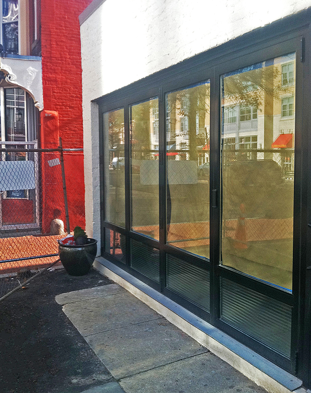 Bifold door/folding glass wall.