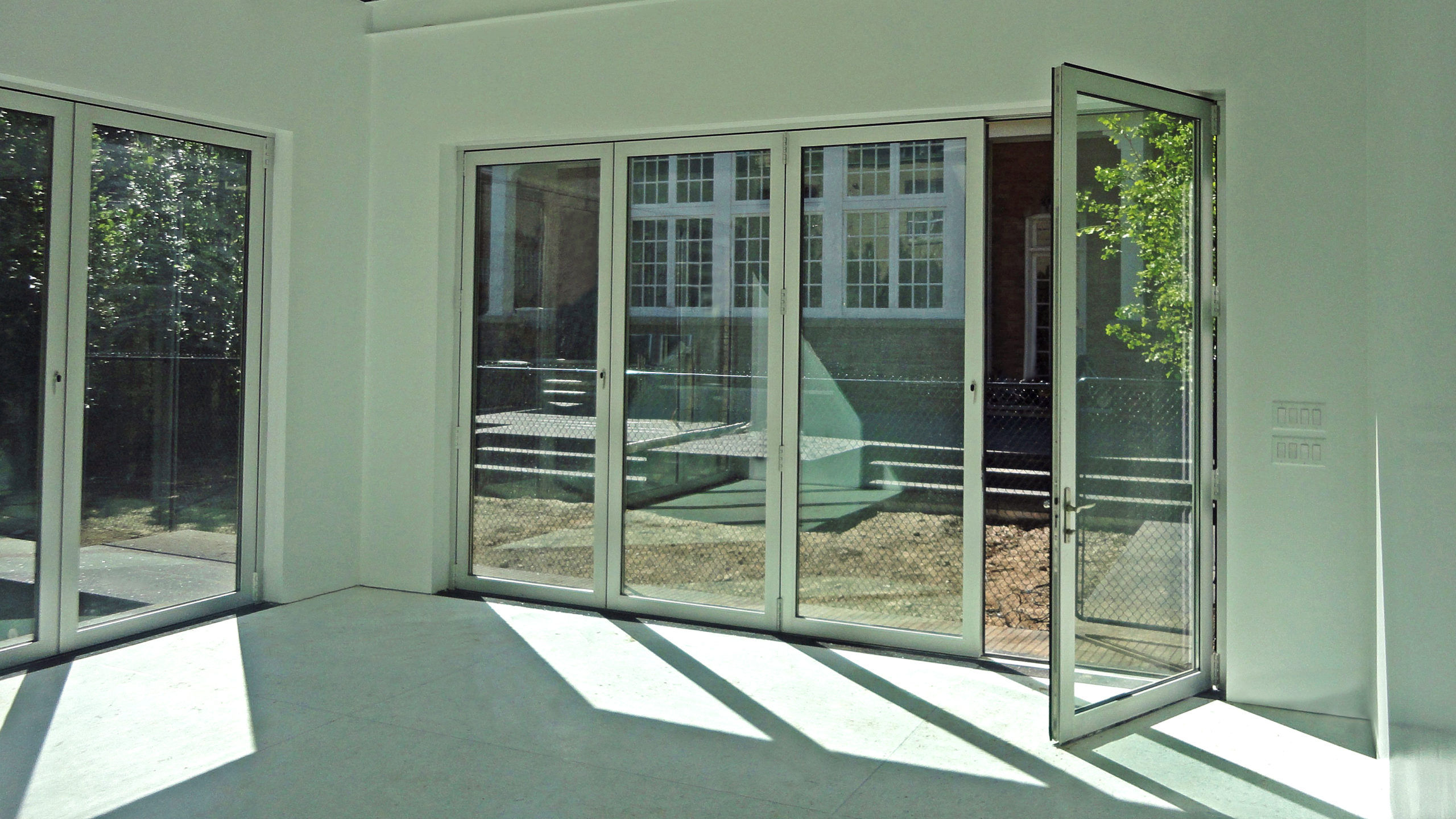 Bifold doors/folding glass wall.