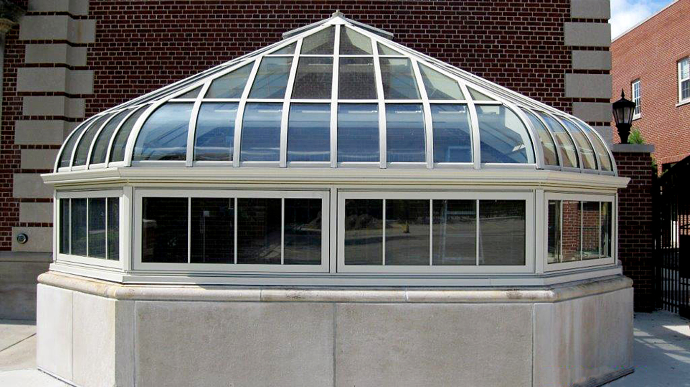Restored conservatory nose on an institutional setting.