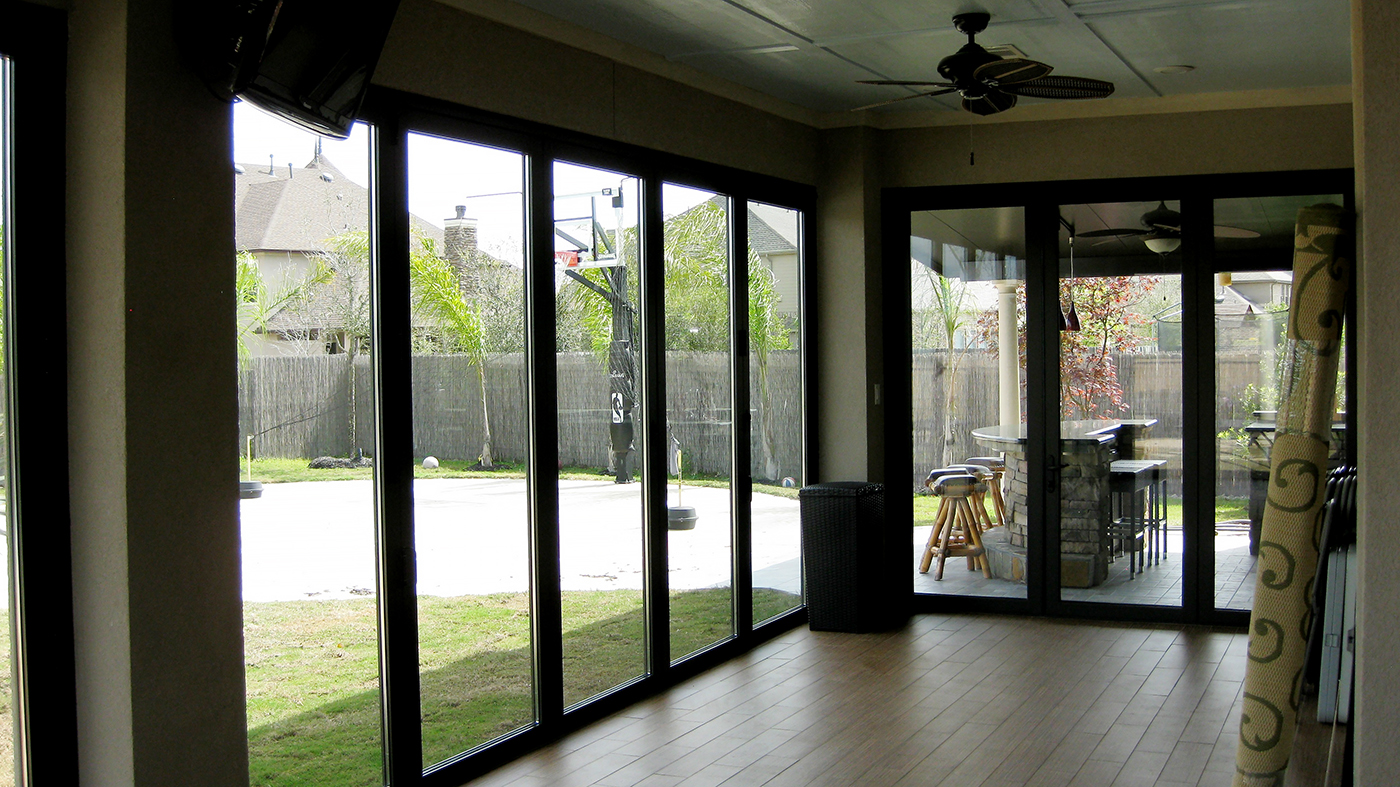Four sets of folding glass walls with varying configurations, all using recessed sills.