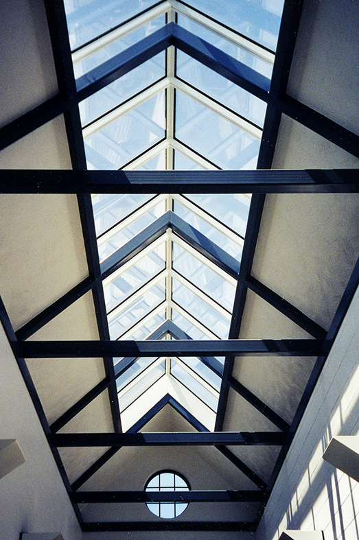 Double pitch skylight aligned over structural steel sub frame.