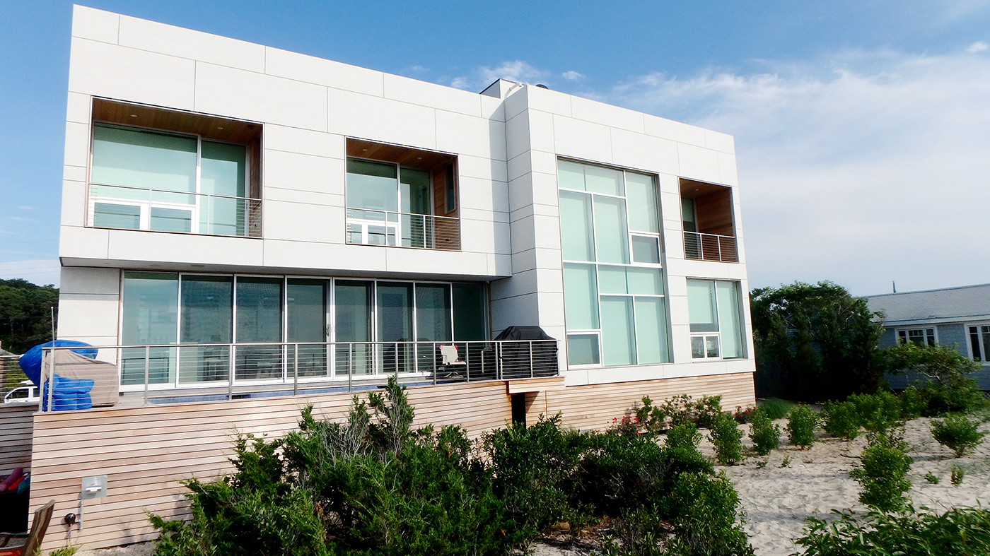 This complete glazing package adds the perfect touch for this modern beach home.
