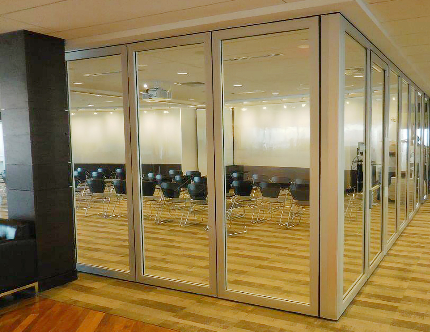 This project features multiple folding glass wall systems with all wall configurations.