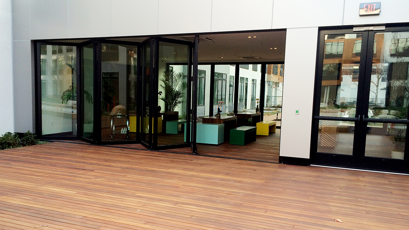 Features multiple folding glass wall systems with all wall configurations.