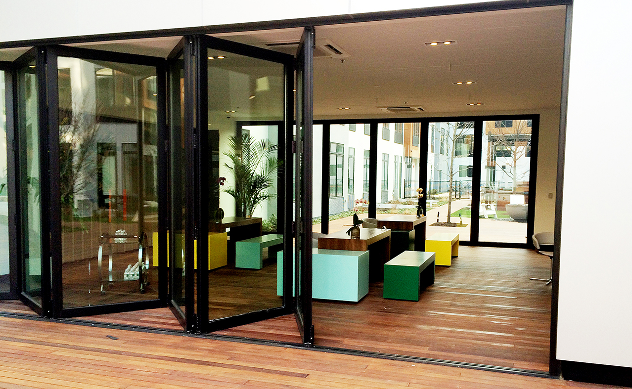 Features multiple folding glass wall systems with all wall configurations.