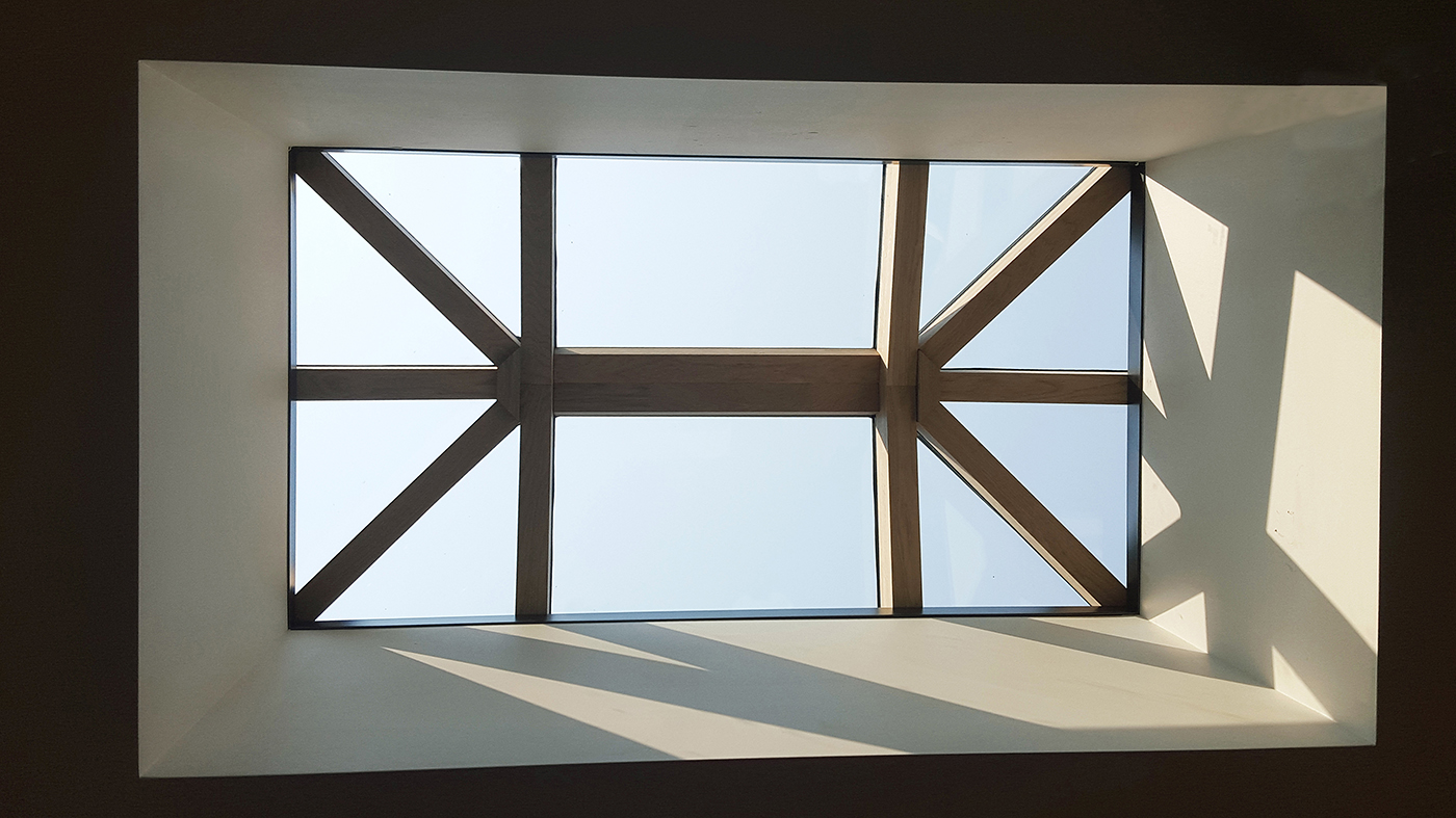 Straight eave double pitch skylights