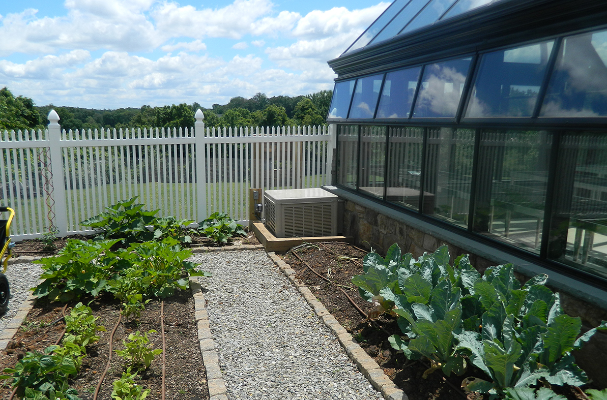 Straight eave, double pitch greenhouse with 2 gable ends.