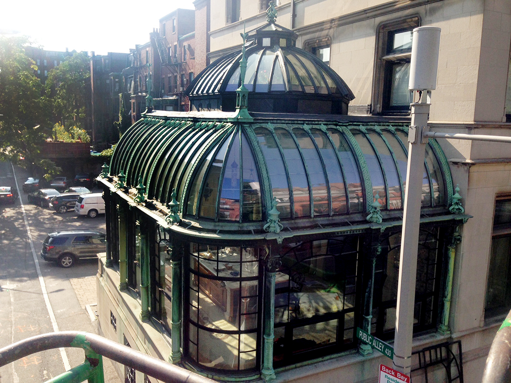 Restoration project on conservatory with aluminum curtain walls and radius glazing
