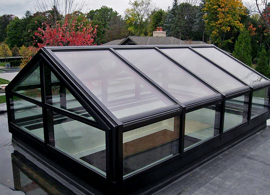 Straight eave double pitch skylight with transom