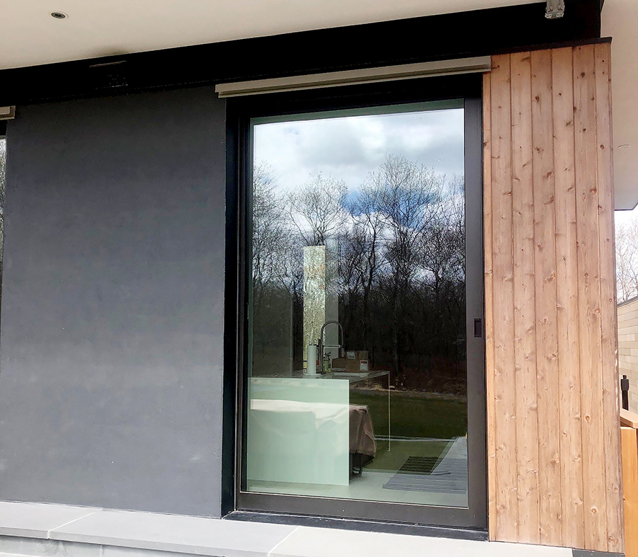 Complete glazing package with Multi-track sliding door and window systems, terrace doors